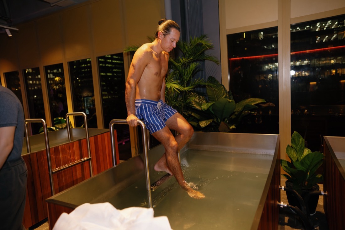 Guest stepping into the cold plunge